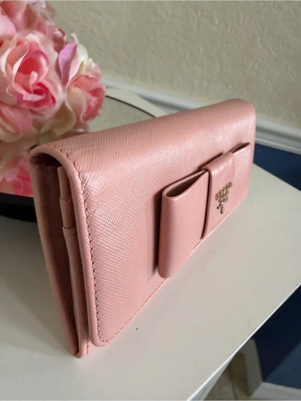 Pink Prada Saffiano leather long wallet flap closure with bow